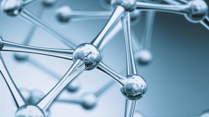 A transparent plastic molecule structure, representing polymers testing, polymer compounding, and processing.
